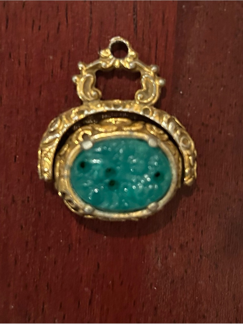 Gold-Tone Pendant with Jade color Cabochon spinner